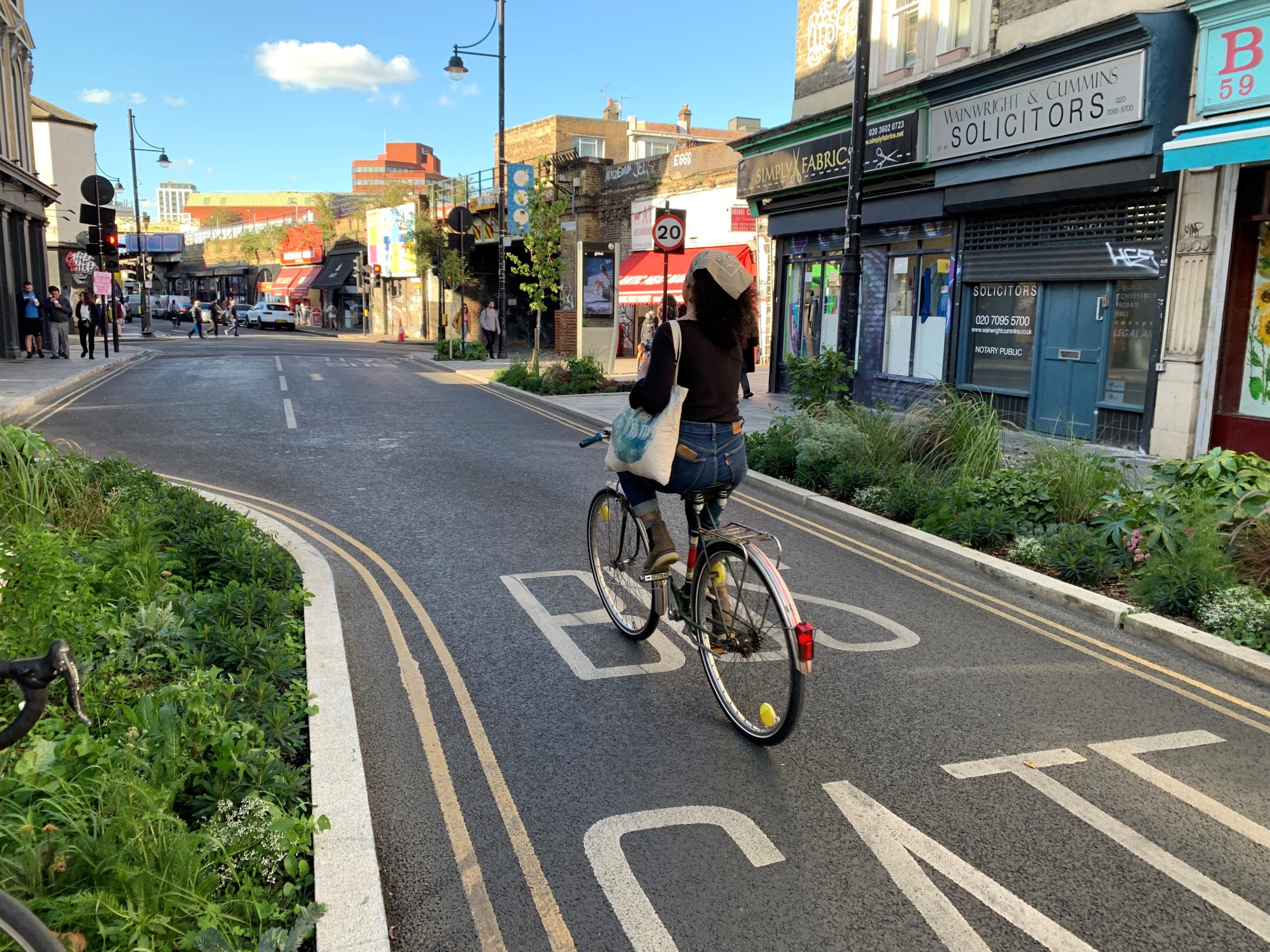 person cycling through a traffic filter